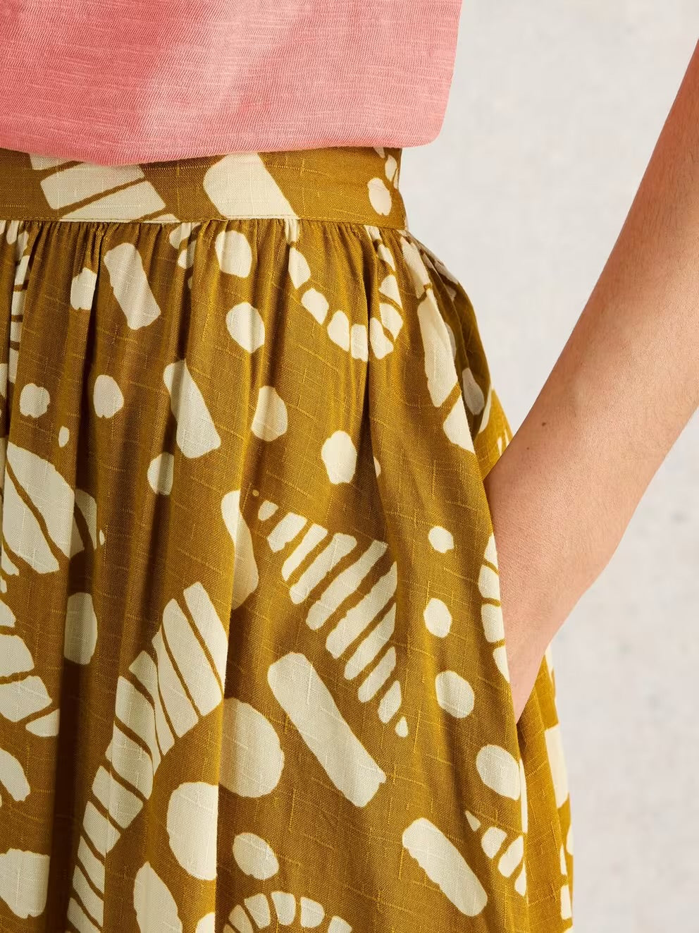 Abigail Midi Printed Skirt in Yellow by White Stuff