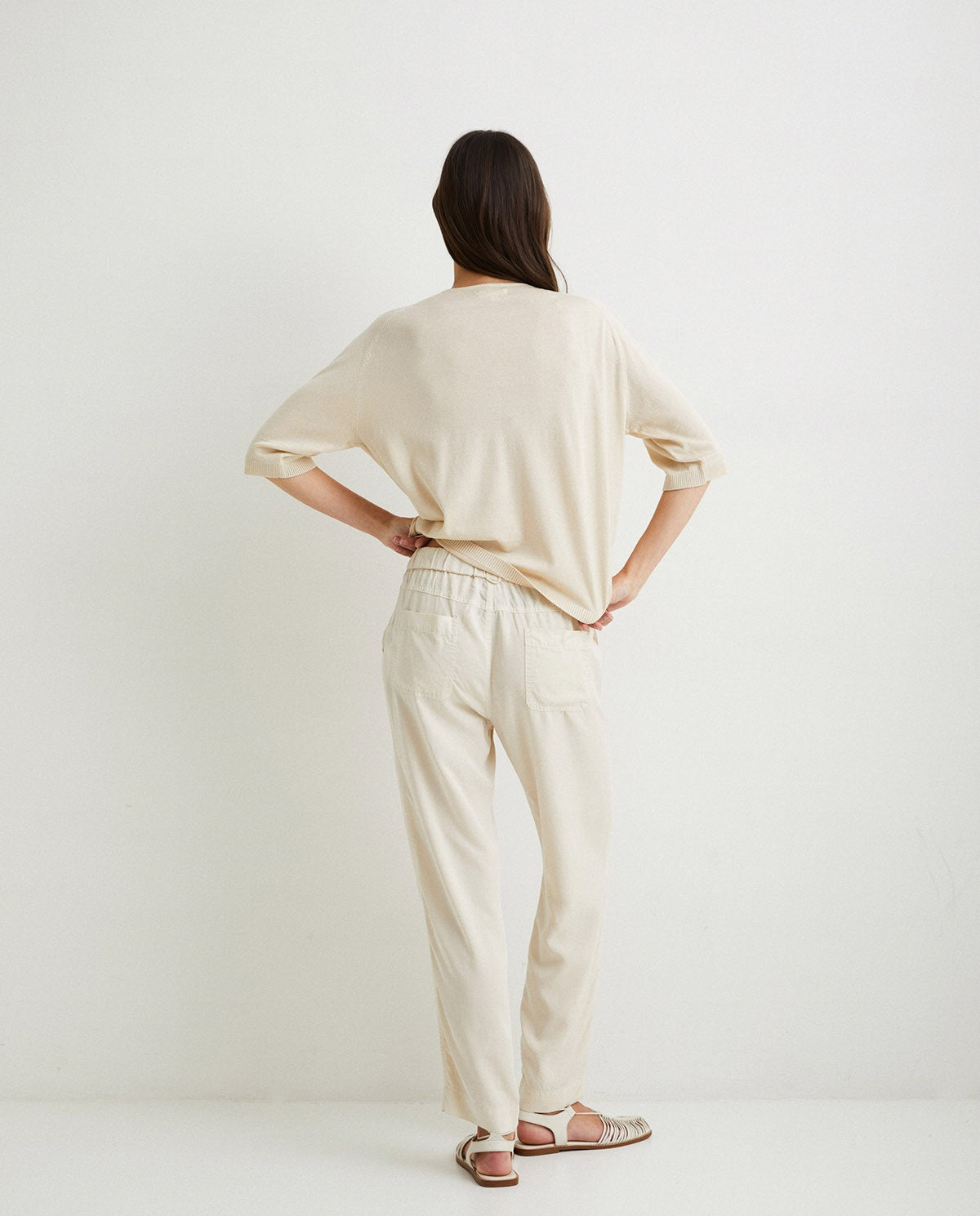 Flowy tencel trousers in ivory by YERSE