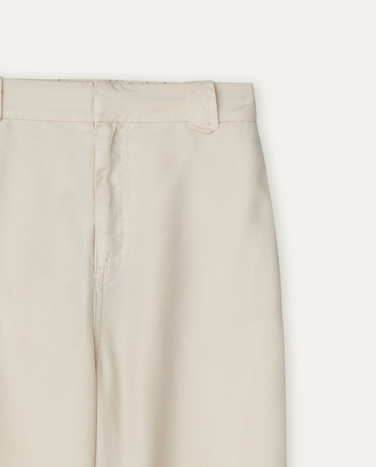 Flowy tencel trousers in ivory by YERSE