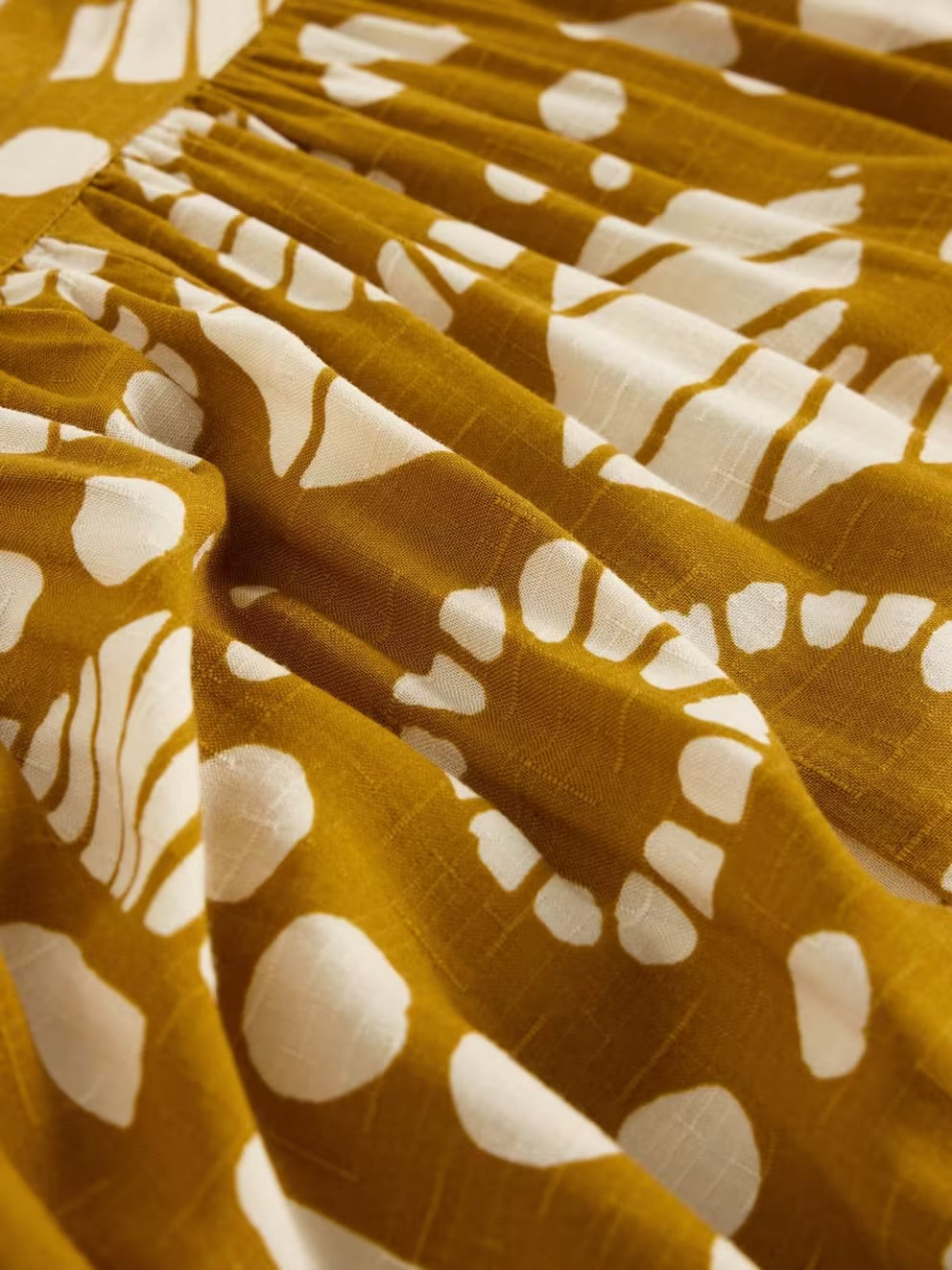 Abigail Midi Printed Skirt in Yellow by White Stuff