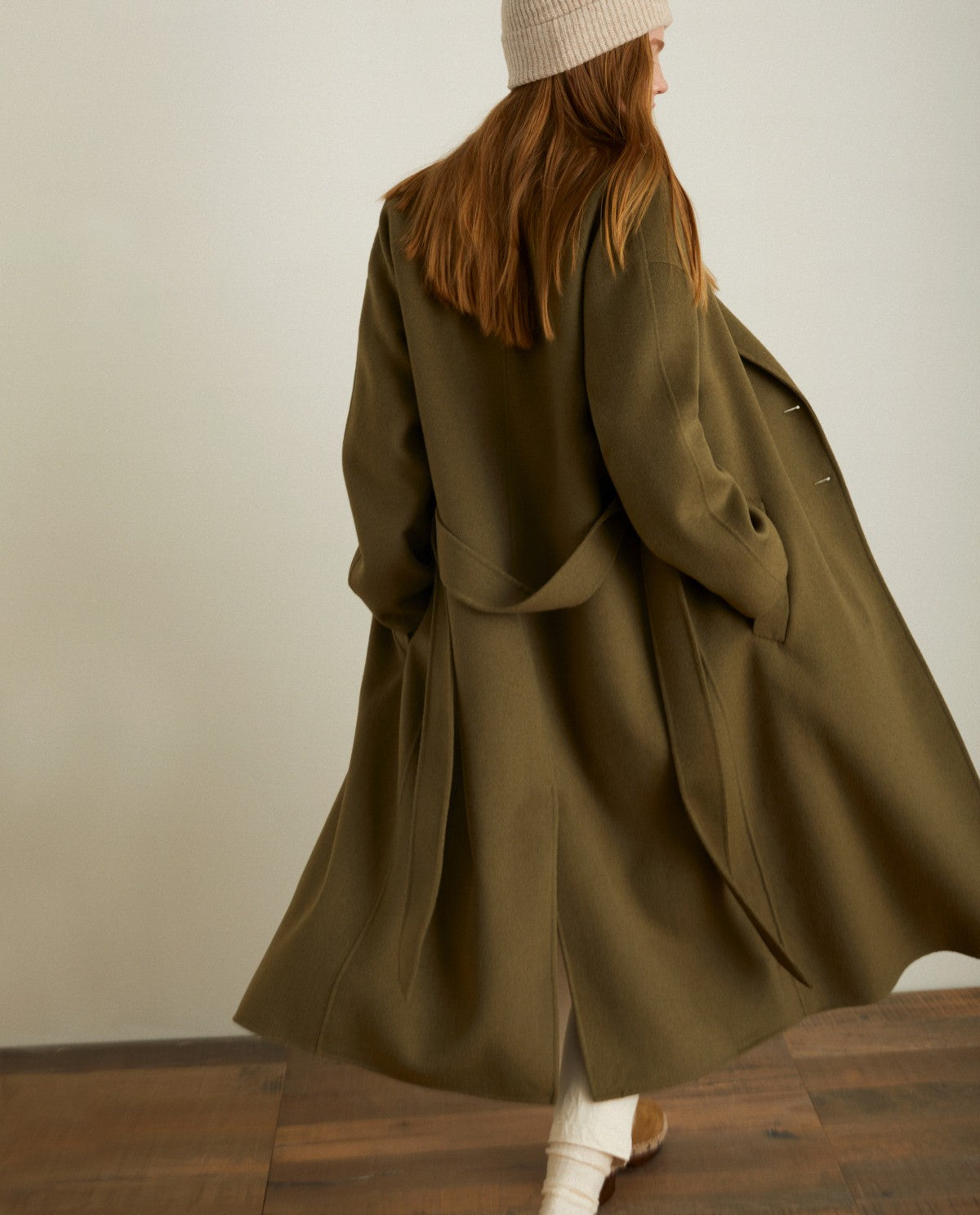 Green handmade long coat by YERSE