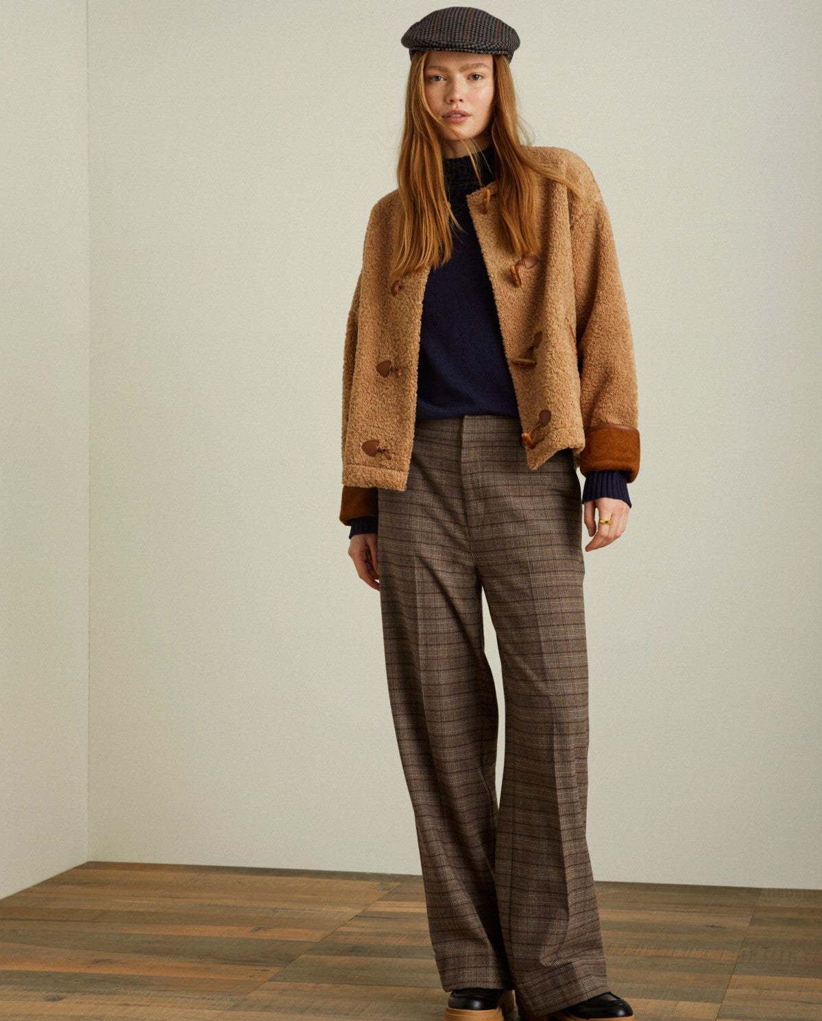 Flared wide ankle checkered trousers in chocolate by YERSE