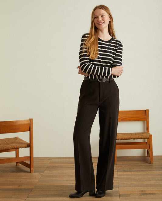 Flared wide ankle trousers in black by YERSE