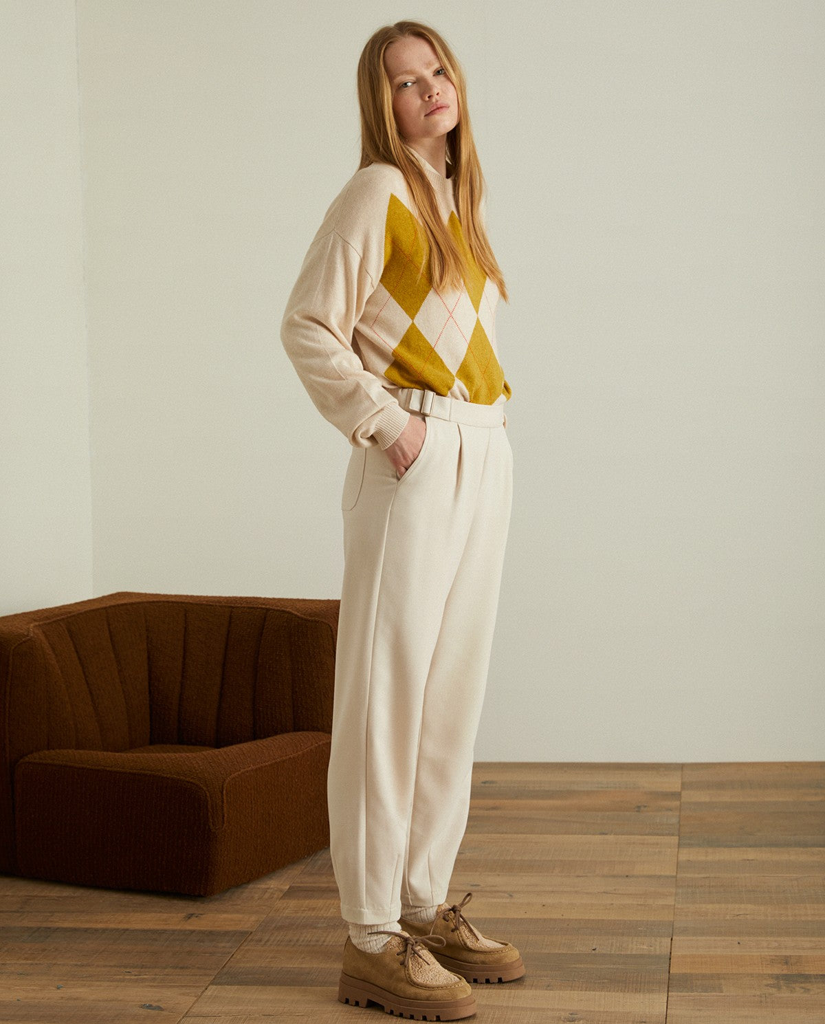 Pleated ankle trousers in ecru by YERSE