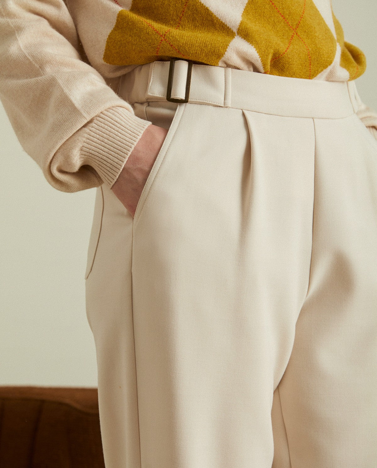 Pleated ankle trousers in ecru by YERSE