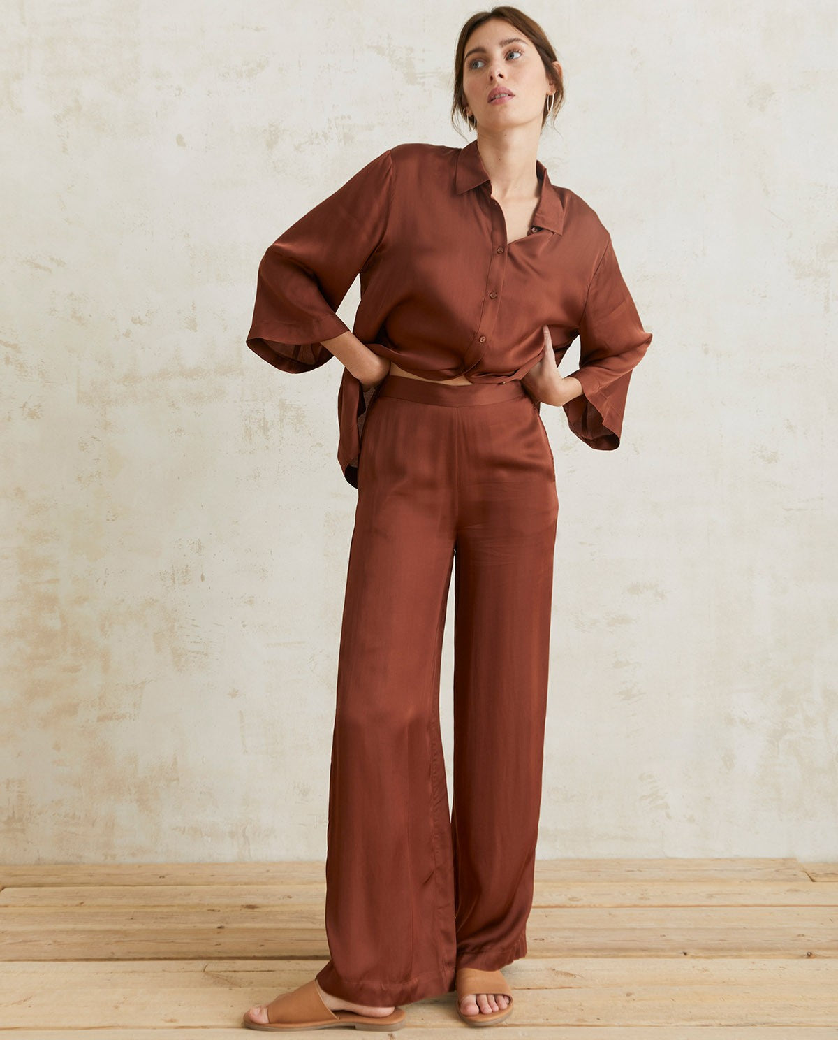 Flowy sateen chocolate trousers by YERSE