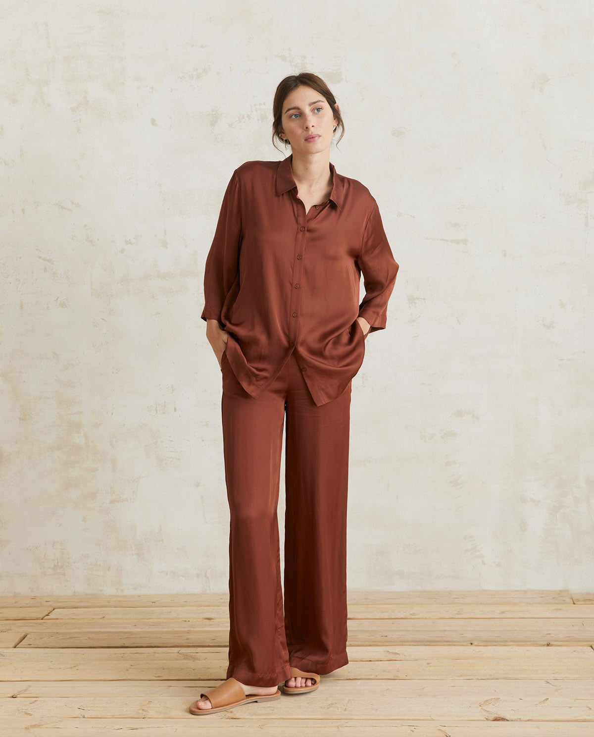 Flowy sateen chocolate trousers by YERSE