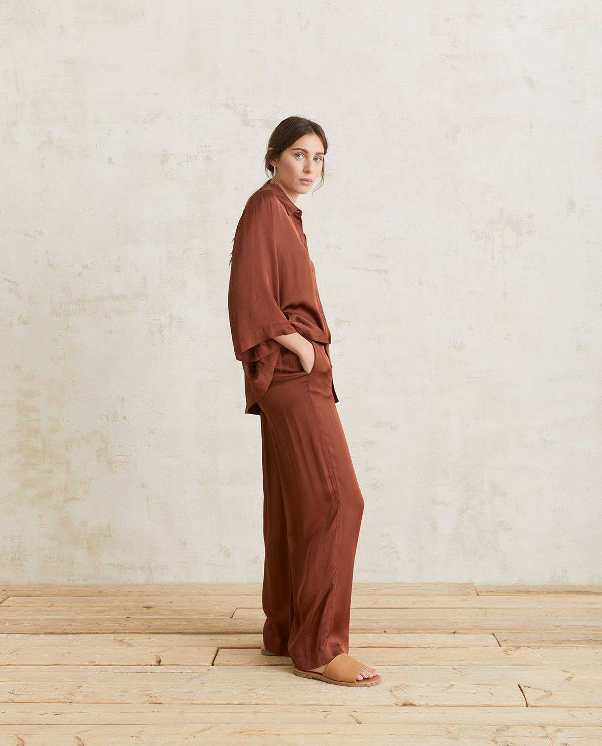 Flowy sateen chocolate trousers by YERSE