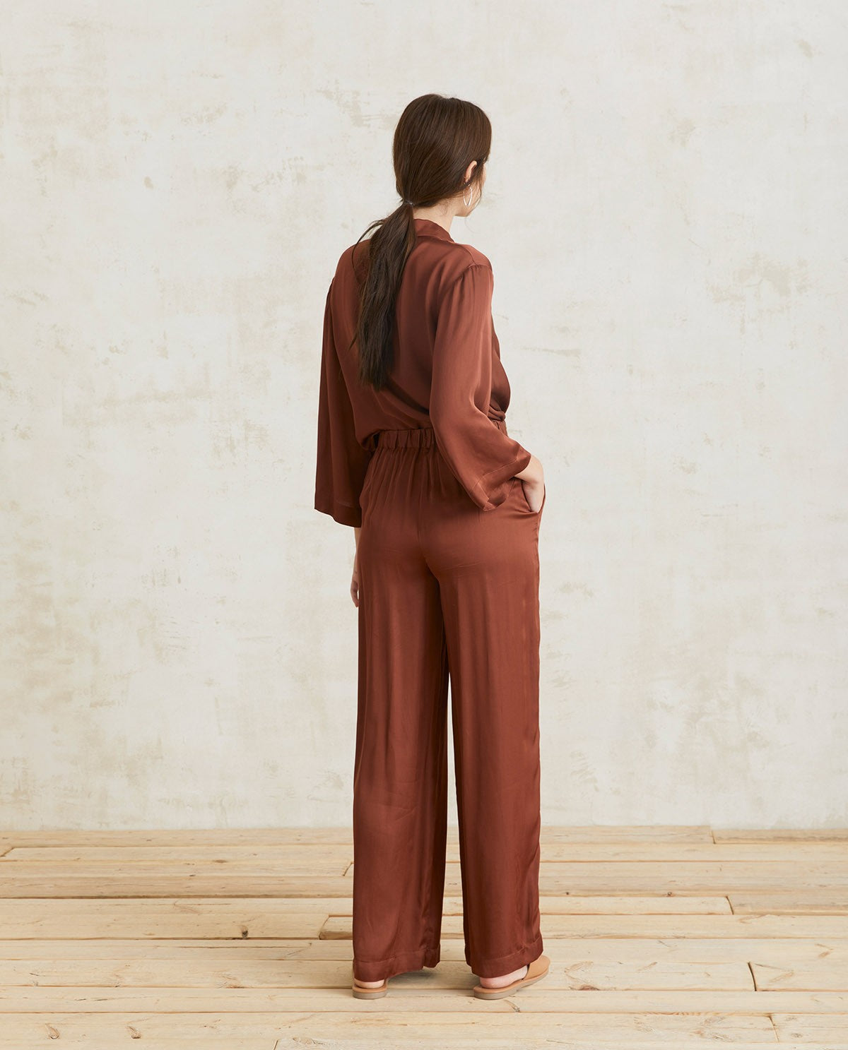 Flowy sateen chocolate trousers by YERSE