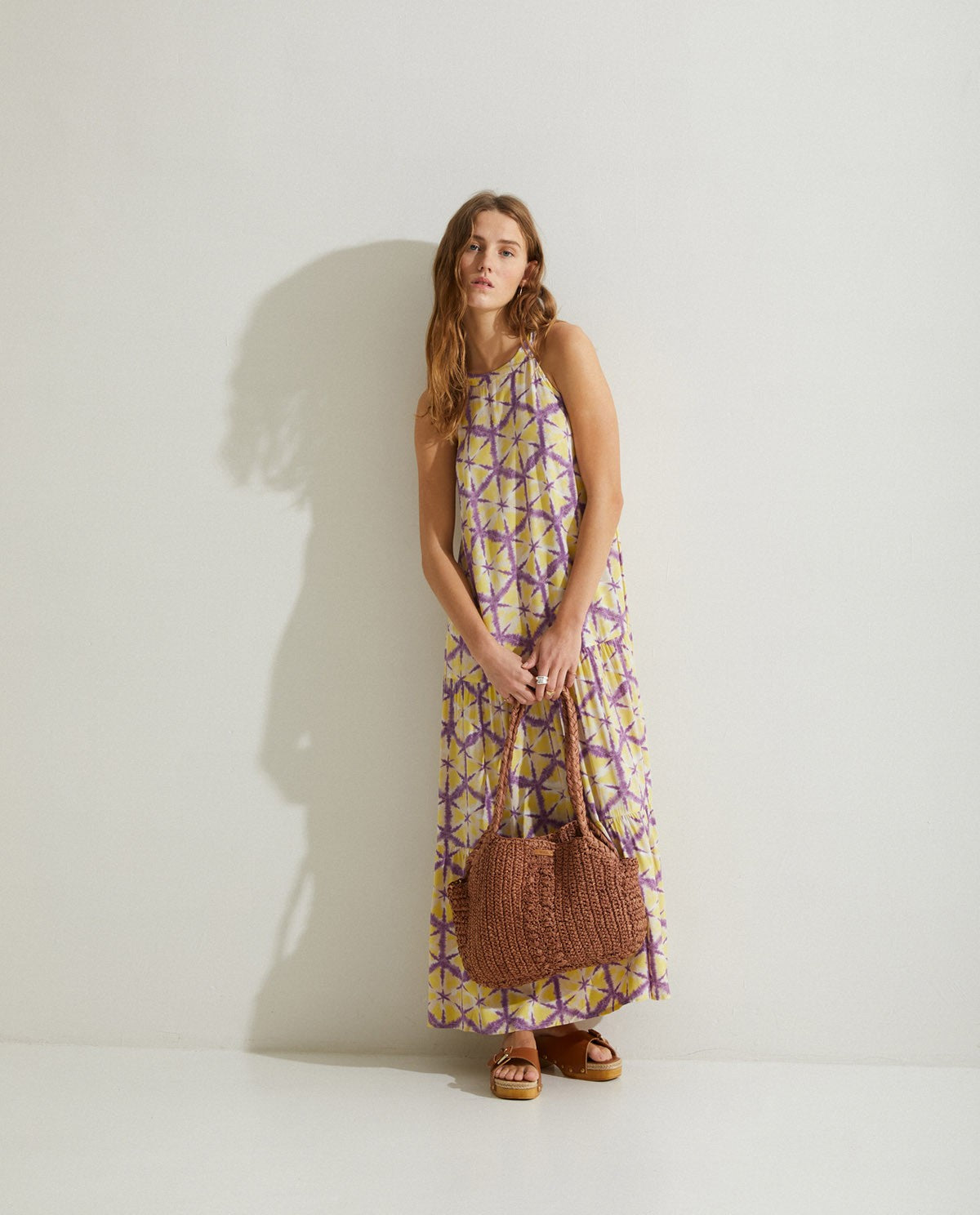 Halter neck tie-dye long dress in Yellow by YERSE