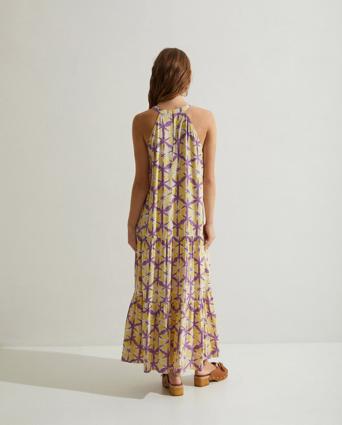 Halter neck tie-dye long dress in Yellow by YERSE