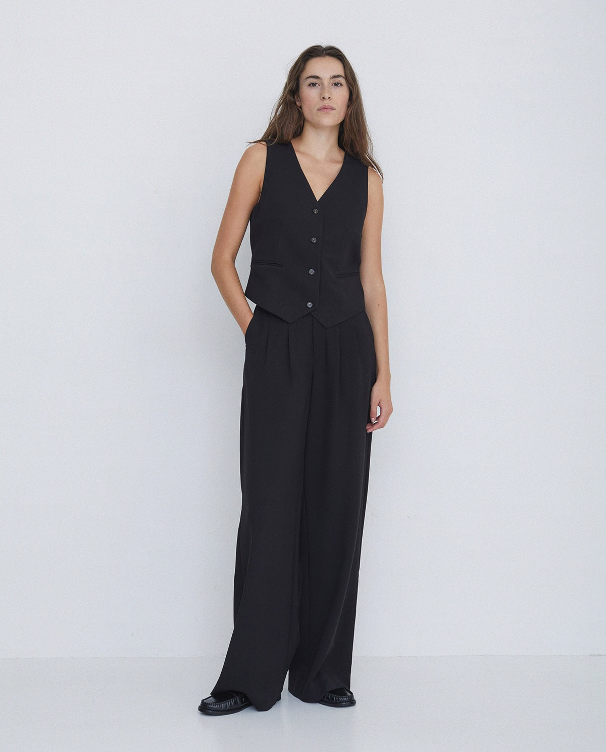 Wide Pleated Trousers in Black by YERSE