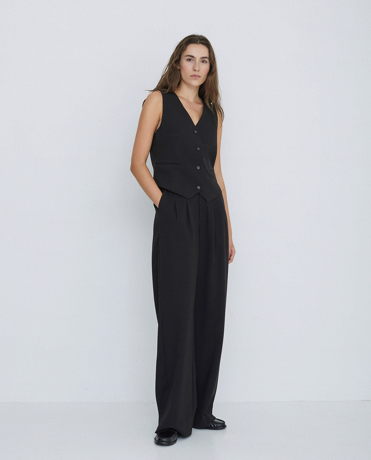 Wide Pleated Trousers in Black by YERSE