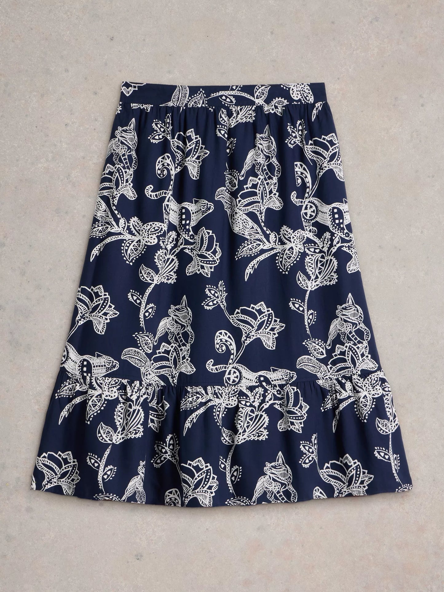 AVA Reversible Skirt in navy OR plum print by WhiteStuff