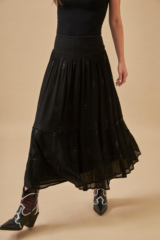 Long black embroidered skirt by NKN