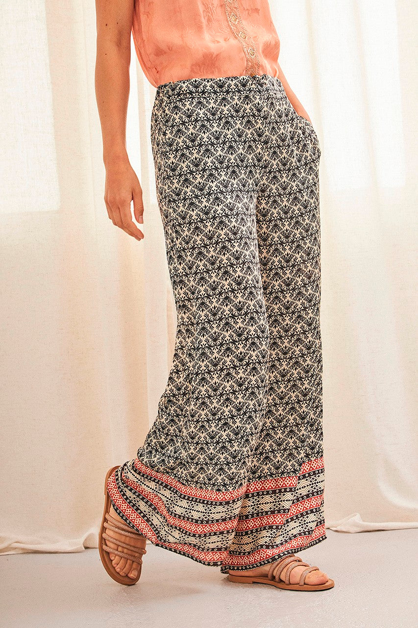 Wide trousers with black & white pattern by NKN