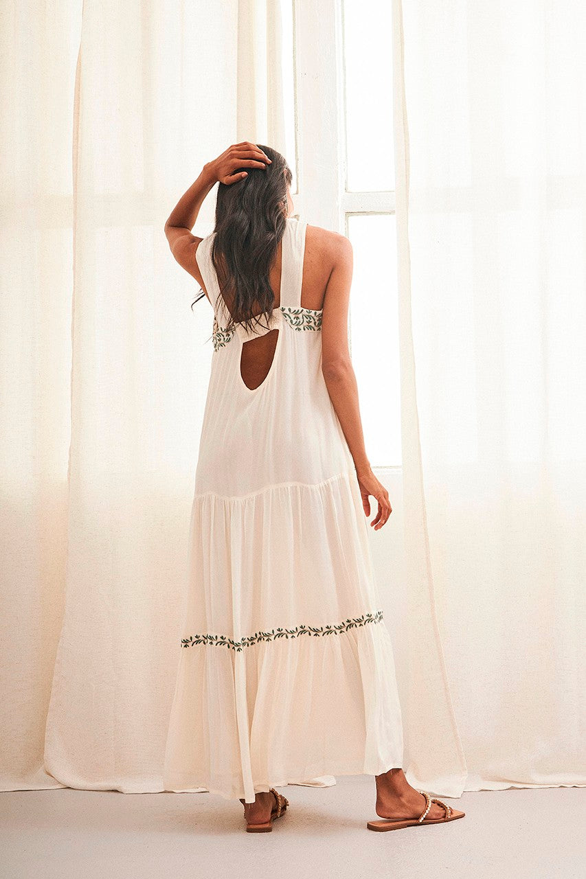 Long white dress with petite-embroidered details by NKN