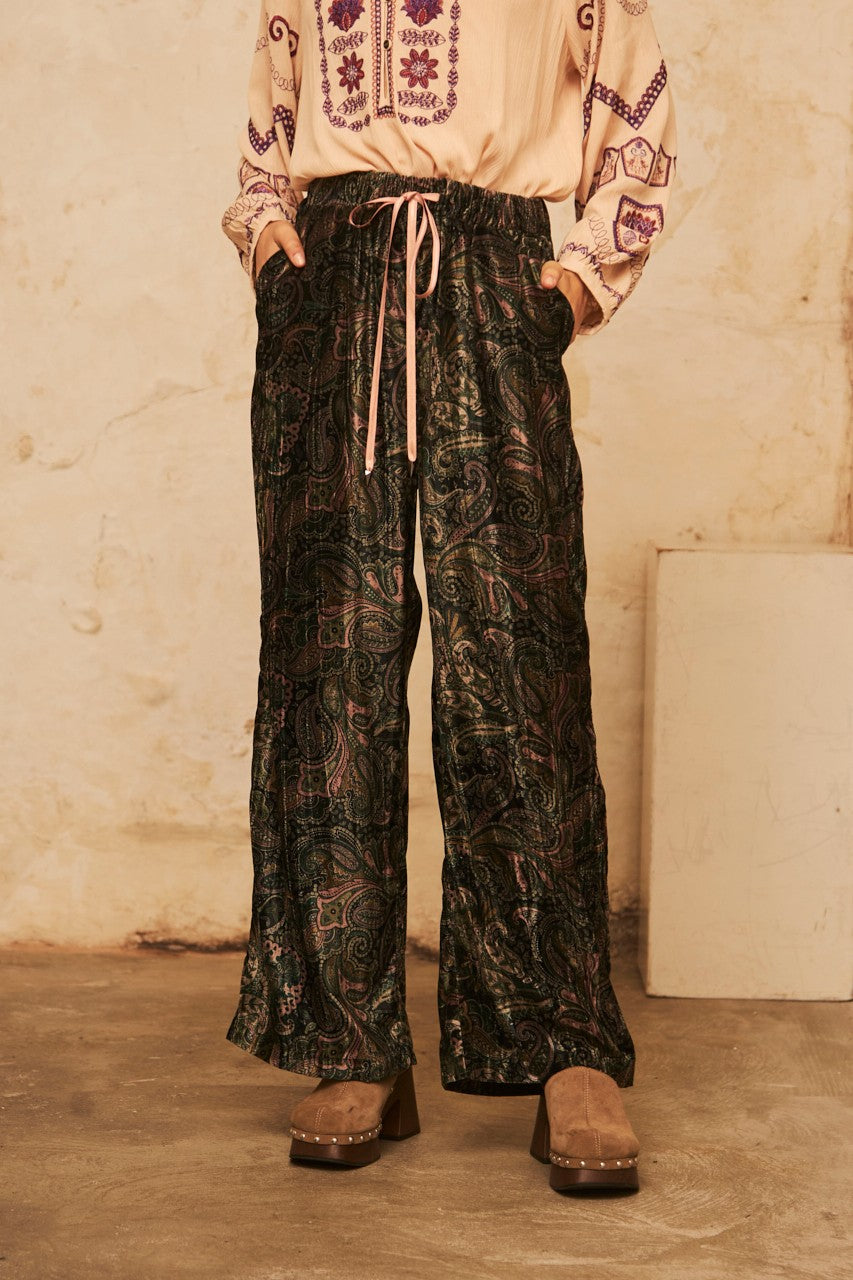 Printed Velvet Trousers in dark green by NKN