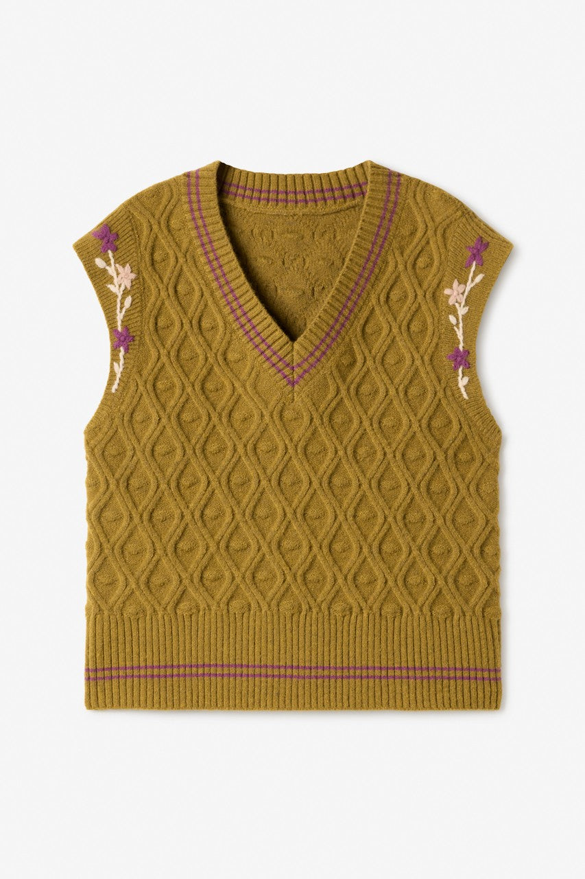 Green knit vest with embroidered floral armholes by NKN