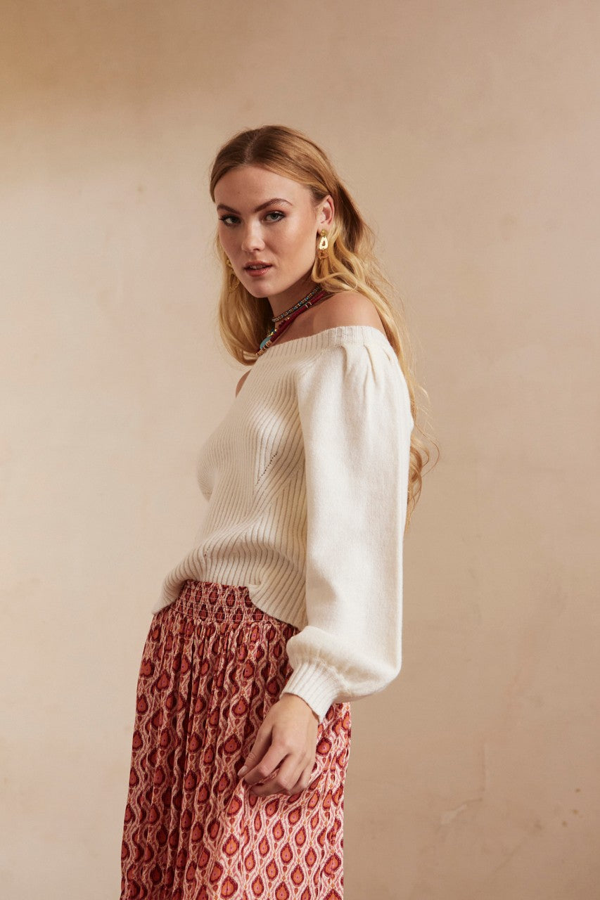 Off-shoulder sweater in cream by NKN